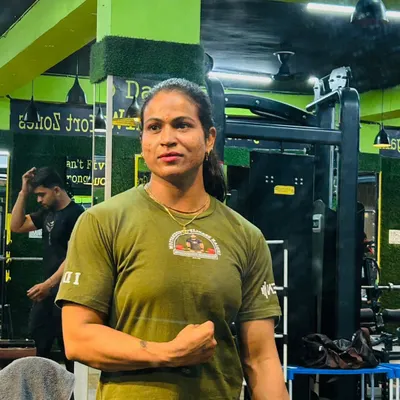 A moment of focus in the gym. The journey to becoming stronger is a mental game as much as a physical one.