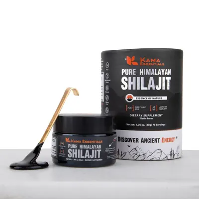 A creative shot of Pure Himalayan Shilajit, showing the product, its packaging, and the resin's texture on an applicator.
