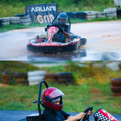 Racing in the rain is a true test of skill. Here you can see our drivers navigating the slippery conditions, focused and ready for the challenge.