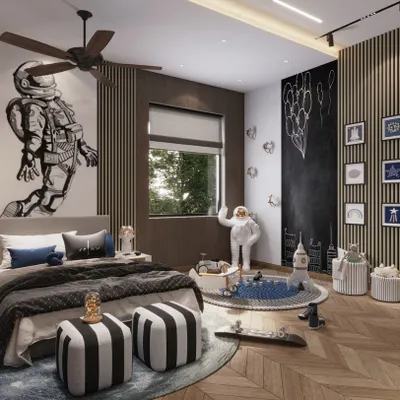 This space-themed bedroom is designed to inspire adventure. The large astronaut mural, chalkboard wall, and gallery of themed art create a dynamic and interactive environment for a young explorer.