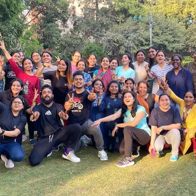 A wonderful group photo from an outdoor corporate wellness event I hosted for SBI. Getting teams out of the office to move and laugh together is a fantastic way to boost morale and team spirit.