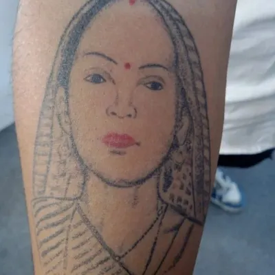 Before: The original portrait tattoo was faded, with unclear lines and minimal shading, lacking depth and realism.