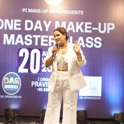 On stage during a one-day makeup masterclass in Akola, Maharashtra. I love traveling and sharing my knowledge with aspiring artists all over the country.