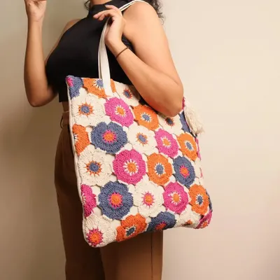 This is my most popular Bohemian tote bag, and you can see why. It’s large enough for daily use and the vibrant colors make any outfit pop. I designed it to be the perfect companion for a day out, whether you're going to college or shopping.