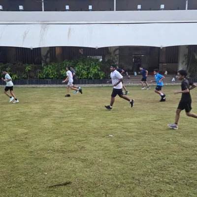 My players during an outdoor running session as part of our summer camp fitness program. Building a strong cardiovascular base is crucial for endurance in long matches.