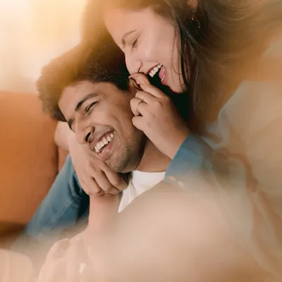 A moment of pure, unscripted laughter during a cozy studio shoot. This is what it's all about: forgetting the camera and just enjoying each other.