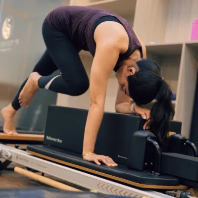 This mountain climber variation on the Reformer is an intense core challenge. It requires stability through the shoulders and abs while the legs are in motion, building functional strength.
