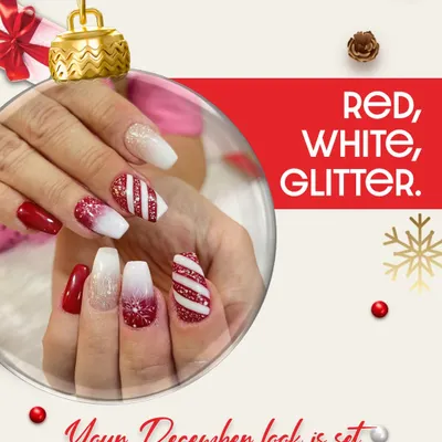 Your December look is set with these festive Christmas nails. This set features candy cane stripes, a glittery red-to-white ombre, and snowflake details on coffin-shaped extensions.