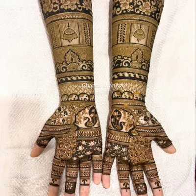 A special design for the holy Jain festival of Paryushan. This intricate mehendi features traditional symbols and the auspicious "Tapasvi Amar rho" blessing, created with deep respect and devotion.