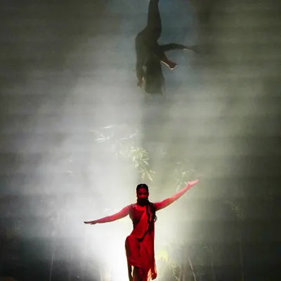 A dramatic aerial and stage sequence from the 'Sitayana' production. These large-scale shows often involve complex choreography and stagecraft to create breathtaking moments for the audience.