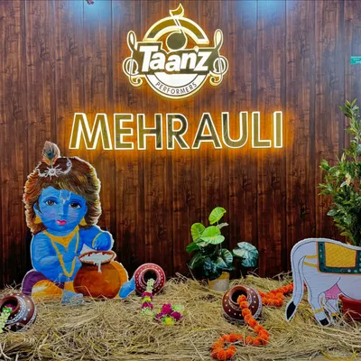 Our studio is all set for Janmashtami. We create a festive atmosphere with traditional decorations like hay, matkas, and a beautiful cutout of little Krishna.