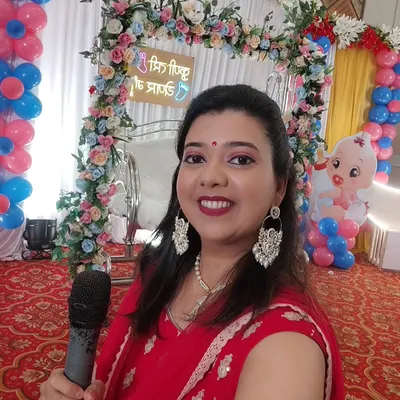 A happy selfie from a fun baby shower. I'm Ruchi, your host and your friend, ready to make your celebration unforgettable.