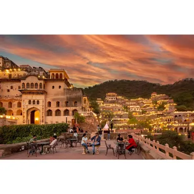A twilight photograph of the Neemrana Fort-Palace, designed to evoke a sense of wonder. This is a key shot from my architectural photography portfolio, emphasizing the property's grandeur.