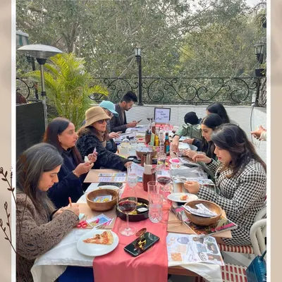 A beautiful afternoon spent creating and connecting. You can see everyone deeply focused, cutting and pasting images that resonate with their goals. This is a space free of judgment, where your dreams are given room to grow.