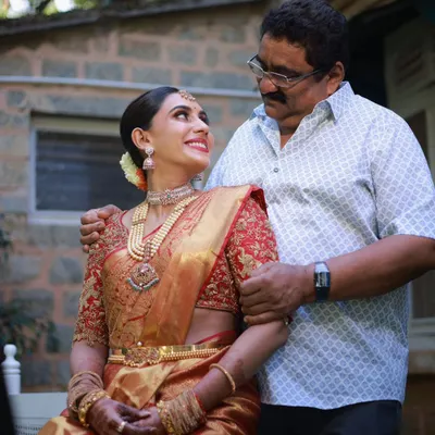 A heartwarming moment between the bride and her father. It's a privilege to witness these special family moments while ensuring the bride looks and feels her absolute best.