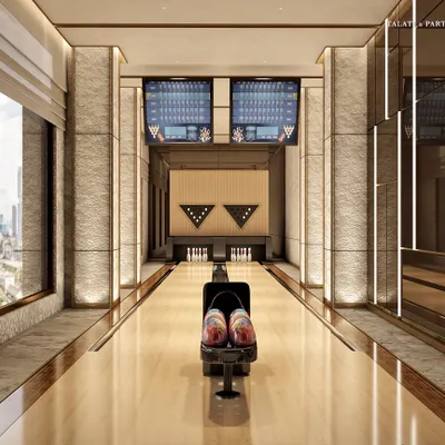 The city's loftiest bowling alley, located in our South Mumbai residential tower. This state-of-the-art amenity offers endless entertainment with breathtaking, panoramic views of the urban landscape through a full-length window.
