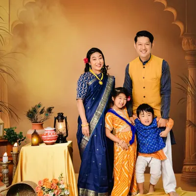 A unique and beautiful portrait of a Japanese family dressed in traditional Indian clothing. This photo showcases our ability to create customized, culturally significant themed shoots against a fine art backdrop.