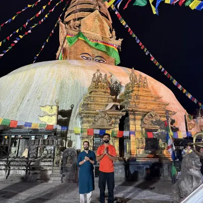 In the quiet of the night, we stand in reverence before the great Bouddhanath Stupa in Nepal. The air is thick with prayer, and the eyes of the Buddha watch over us as we offer our gratitude.