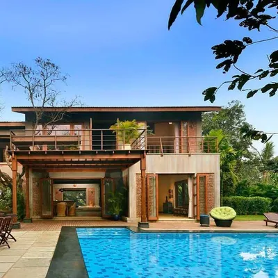 The 5 Element House, designed as a home for celebrating life with family and friends. The architecture, with its infinity pool overlooking Pavna Lake, lives in harmony with the elements of earth, sky, air, and water.