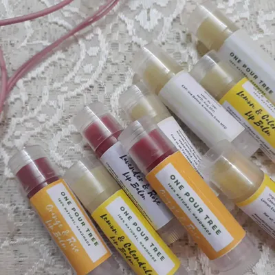 A collection of my 100% natural handmade lip balms. Made with Olive Oil and Shea Butter, they come in several varieties like Orange & Rose, Lemon & Calendula, and Lavender & Rose to keep your lips soft and hydrated.