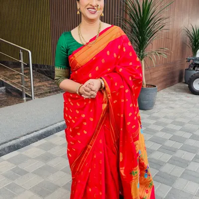 A full-length shot of the lovely actress Madhurani Prabhulkar in a classic red Paithani saree. I created a timeless look with a simple bun and traditional jewelry.