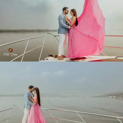 A stunning shot from Sahiba and Anshay's pre wedding shoot on a yacht in Goa. The bride's flowing pink dress creates a dramatic and romantic effect against the open water.