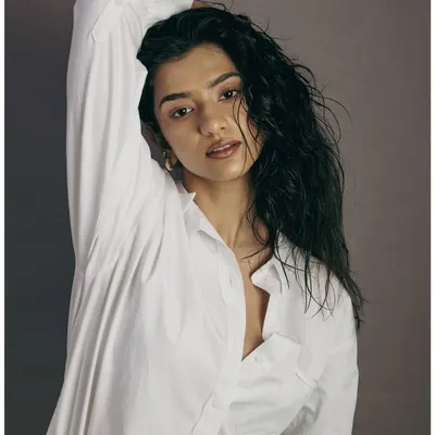 A fresh and natural studio portrait with a 'wet hair' look. This type of shot shows a model's raw beauty and is essential for any portfolio.