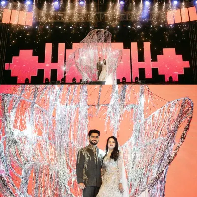 This grand sangeet entry was designed to feel like a concert. The couple emerged from a custom-made shimmering structure, framed by a massive stage, dazzling lights, and electrifying pyrotechnics.