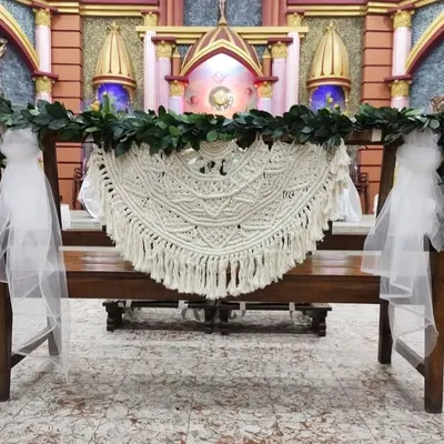 A few years ago, I had the honor of creating macrame pieces for a wedding. This large, semi-circular macrame hanging looked so beautiful decorating the church altar.