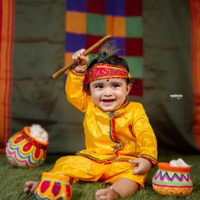 This is our natkhat Gopal, Rudra, whose infectious smile made my day. I love creating these vibrant, playful setups for Janmashtami, capturing the divine and mischievous spirit of Kanha in your little one. It’s a joy to bring these cultural stories to life.