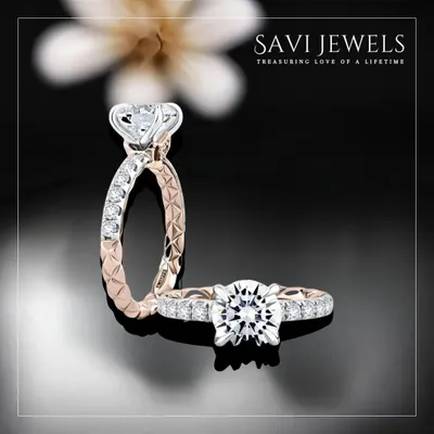 The perfect ring for the biggest day. This stunning solitaire is set on an intricately detailed band of rose gold and diamonds, designed to be a timeless symbol of your commitment.