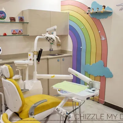 For the pediatric section of Dr. Khanna's Dental Clinic, I designed a treatment room that feels friendly and non-intimidating. The cheerful yellow chair, rainbow wall mural, and cloud-shaped shelves create a positive and distracting environment for young patients.