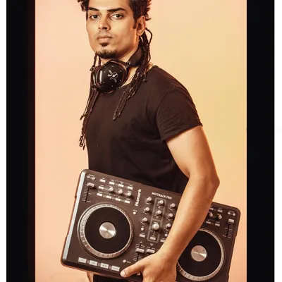 A classic artist portrait. Me, my headphones, and my controller. This is where the magic starts.