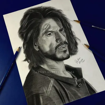 A pencil sketch of Shah Rukh Khan in his look from the movie "Pathaan." This portrait captures the intensity and rugged charm of the character.