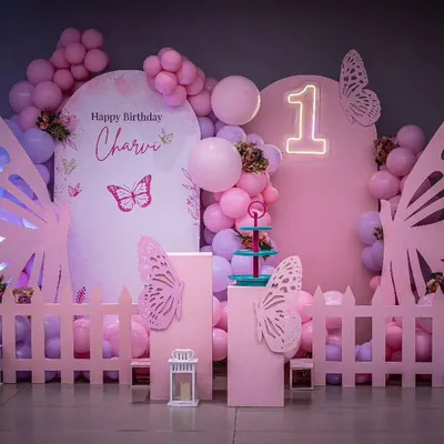 A brand new butterfly theme setup, designed in shades of pink with large, elegant wing cutouts and a custom neon sign. I create a fresh moodboard for every celebration to ensure your party is unique.