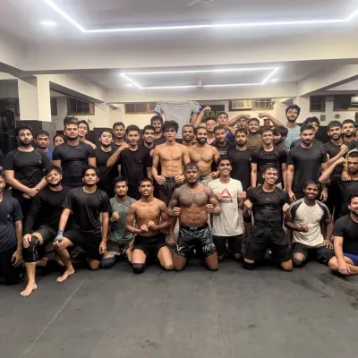 The wrestling squad after a tough session. Sweat, smiles, and a shared sense of accomplishment. This is our tribe.
