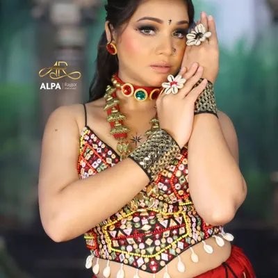 A close-up of the Navratri makeup, featuring a dramatic smokey eye, flawless skin, and traditional jewelry. This look is designed to be bold and expressive.