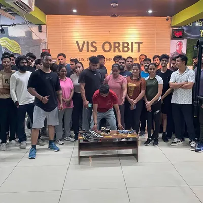 Celebrating our team's success at the IDF Delhi State competition. We work hard, and we celebrate our victories together at Vis Orbit gym.