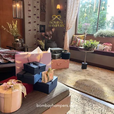 This is a glimpse of the beautiful gifting options available at our studio. We offer a variety of luxe hampers, from vintage-style trunks to modern gift boxes, that serve as the perfect foundation for a curated present. These are ideal for wedding welcome gifts, corporate events, or personal milestones.