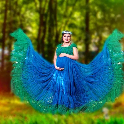 This is the kind of magical moment I love to create. Using a flowing gown in a beautiful outdoor setting, we can capture a portrait that is both powerful and serene, celebrating your journey in a truly epic way.