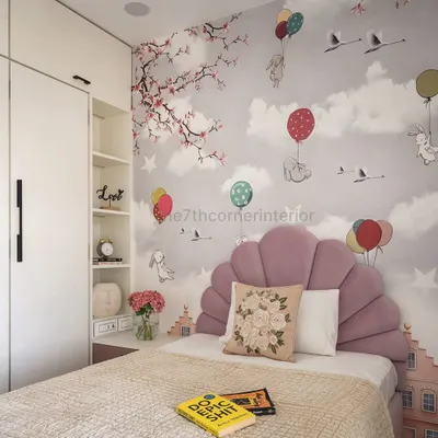 A close-up of this whimsical kids' room, highlighting the mauve, scallop-shaped velvet headboard and the charming custom wallpaper. The design is a beautiful blend of softness, whimsy, and functionality.