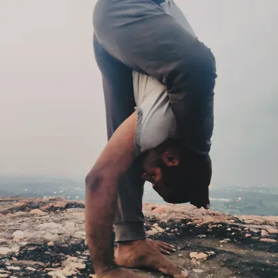 In a deep forward fold like Uttanasana, we practice Dharana, the art of concentration. It is about letting go of distractions and bringing the mind to a single point of focus.