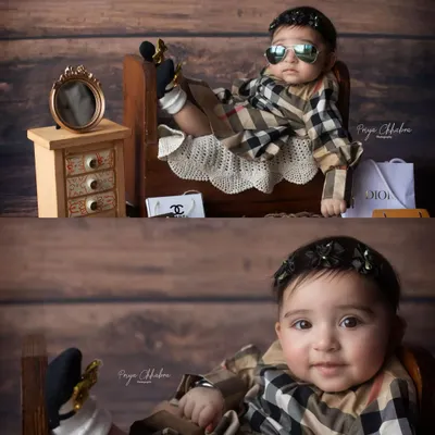 Mini model, major attitude. This designer-themed shoot was so much fun to style! From the mini shopping bags to the cool shades, this little one completely owned the set.