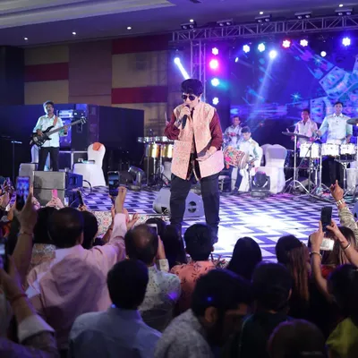 I had the honor of planning a Dandiya night featuring the legendary Falguni Pathak. Managing large-scale artist performances and stage production is a key part of my service.