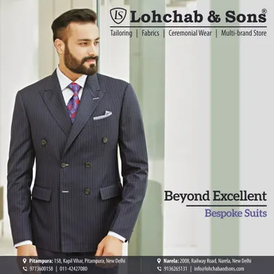 A classic pinstripe double-breasted suit that commands attention. This bespoke piece is crafted for a powerful silhouette, perfect for making a lasting impression in any professional setting.
