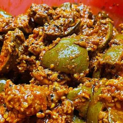A close look at my signature Aam ka Achaar. Each piece of raw mango is coated in a thick blend of traditional spices. It is a taste of nostalgia, made without any preservatives.