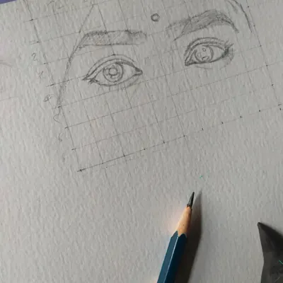 The first step in my process is often a light grid sketch. This helps me ensure all the facial features are correctly proportioned before I start adding any details or shading.