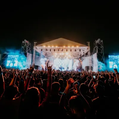 The view from the crowd as Dream Theater takes the stage. We create immersive concert experiences where every fan feels connected to the music, managing everything from stage production to ticketing for legendary international bands.