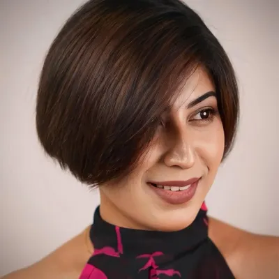 A chic and sophisticated bob haircut. The clean lines and subtle layering create a beautiful shape that is both modern and timeless.