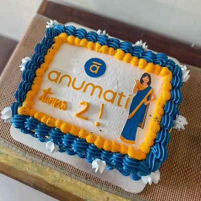 A vintage-style sheet cake for the 2nd anniversary of Anumati. I used their brand colors for the buttercream piping and included their logo and mascot for a personalized corporate celebration cake.